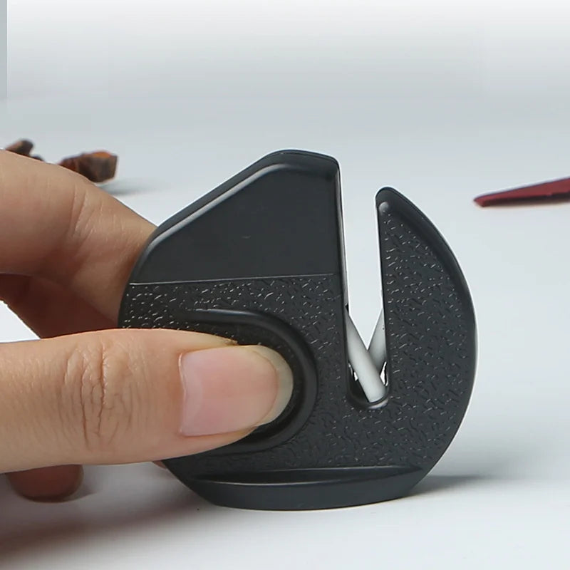 Portable mini sharpener, compact and durable plastic design, suitable for outdoor, camping, and kitchen use